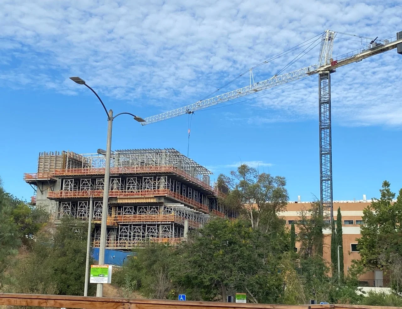 Concrete building construction supported by deputy inspection services